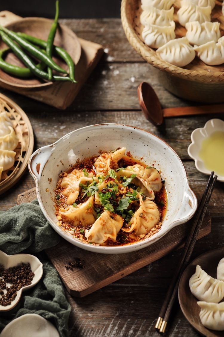 Spicy dumplings served in a rustic bowl